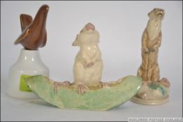 A collection of three ceramic pieces to include a Royal Worcester two piece vent,