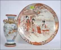 A late 19th early 20th century Japanese Satsuma ware wall charger with applied Geisha girls to the