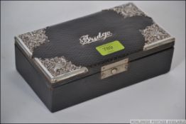 A fine leather and hallmarked silver bridge box with Birmingham assay marks,