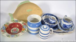 A collection off blue and white ceramics to include TG Green barrel, blue and white platter etc.
