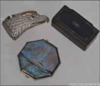 A silver plated vesta in the form of an eagles head together with a ladies shipping line butterfly