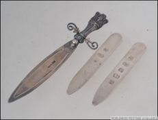 A silver bookmark by Crisford & Norris together with 2 other page marks by Robert Carr, London.