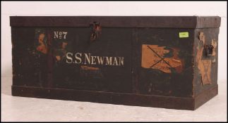 An excellent large 20th century steamer trunk with many original travel stickers and labels.