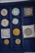 Blue velour clasp fastening collectors case containing various coins to include : 1995 £2 coin ,