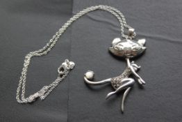A charming ladies Art Deco influence unusual silver and marcasite moon stone cat pendant and