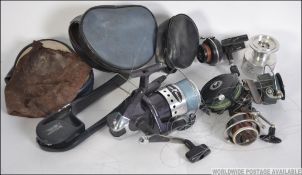A collection of Fishing reels to include a Jarvis Walker Nexium 7000, Garcia Mitchell 810,