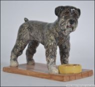 A Royal Doulton Animal Series porcelain figure of a Standard Schnauzer. Measures: 13cms high.