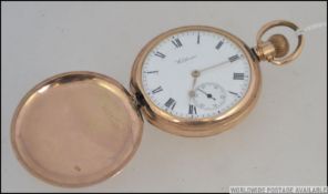 A 20th century Waltham hunter pocket watch in gold plated case with subsiduary seconds dial,