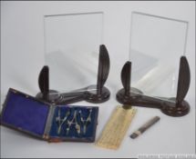 A cased draughtsmens set of smaller proportions along with a silver hallmarked pencil holder,