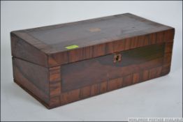 A 19th century Rosewood writing slope ( AF ) having a hinged top lacking interior.
