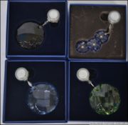 A set of 4 Swarovski crystal glass dream catchers.