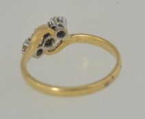 An 18ct gold and Platinum diamond trilogy ring set with three good diamonds a total of approx 50pts.