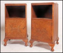 A pair of 1930's Queen Anne walnut bedside cabinets raised on stub cabriole legs with pad feet