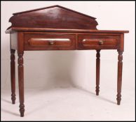 A large Victorian continental solid mahogany writing table / hall table.
