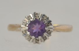 A vintage hallmarked 9ct gold amethyst and diamond ring.