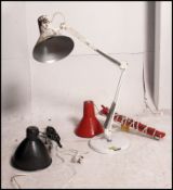 A collection of three vintage / retro machinist / desk anglepoise style work lights all with