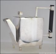 A silver plated Art Deco inspired Christopher Dresser style angular teapot. Measures: 16cms high.