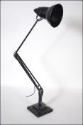 An original 1940's Herbert Terry two step anglepoise Industrial desk lamp having square terraced