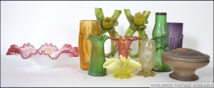 A collection of 19th and 20th century glasswares with some in the manner of Loetz,