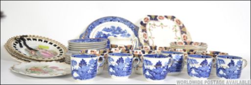 A Staffordshire part service with Imari pattern .