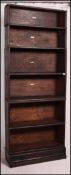 A 19th century Globe Wernicke tall stacking oak lawyers bookcase cabinet having labels verso (