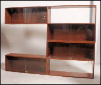 2 1970's teak wood wall mounted modular l-shaped hanging cabinets,