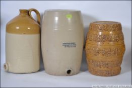 A large late 19th century stone flagon with notation to the front WINTER DRINK COMPOSITION WINE 1D