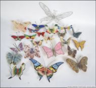 A large decent collection of decorative butterflies , to include ceramic , stained glass ,