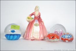 A Royal Doulton figurine entitled Janet HN1537 along with paperweights to include millefiori,