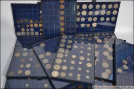 A good collectors case with 12 trays containing unusual mixed coinage such as Indian Anna's ,