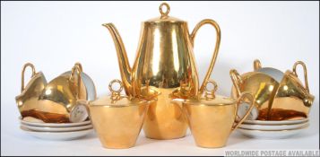 A 20th century continental ceramic gilt lustre tea service of Bareether - Bavaria comprising teapot,