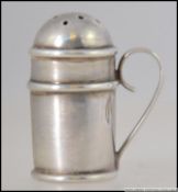A silver hallmarked miniature thimble by S.