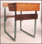 A 1950's vintage tubular metal and beech wood childs school desk.