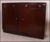 A vintage / retro rosewood sideboard bearing applied lable for Gomme furniture having two long