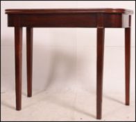 A Georgian 19th century mahogany tea table - games card table being raised on squared legs with