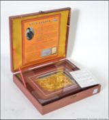 A cased Quxuandiao Chinese mainstream sculpture in case with certificate.