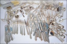 A good collection of plated flatware to include an extensive service to include knives, forks,