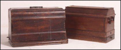 A 19th century Victorian sewing machine in original wooden case having a later conversion to