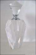 A 20th century art deco style perfume bottle having a screw top glass stopper with attached dabber.