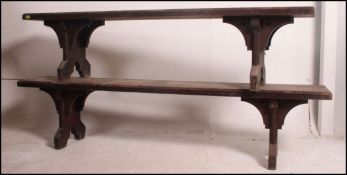 A pair of 19th century oak Victorian Gothic revival church organists pews - bench's having single