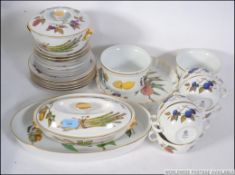 A Royal Worcester Evesham pattern dinner service comprising, plates, side plates,