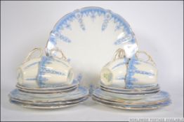 A Victorian Aynsley 6 place part tea service in blue and white bearing markings to the base with RD