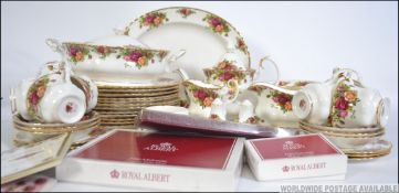 An extensive collection of Royal Albert Old Country Roses china to include tureens, teapot, cups,