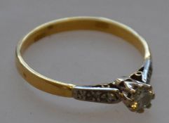 A marked 18ct single stone diamond ring with white gold mount approx .20 carat 2.