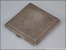 A silver hallmarked ladies compact case having appointed interiors,