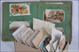 A vintage early 19th century Edwardian post card album featuring some cards of local interest, WWI,