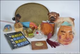 A fantastic dealers lot consisting of a Melba ceramic Bulldog, a brass bulldog wall plaque,