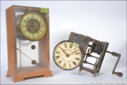 A vintage ' The Lea Recorder Co Ltd ' clock movement along with a Victorian eight day movement