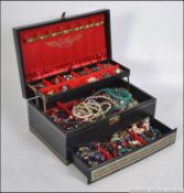 3 tier locking jewellery casket containing a very large amount of mixed costume jewellery