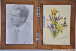 A early 20th century folding walnut picture frame opening to reveal a photo of a gent and a 21st